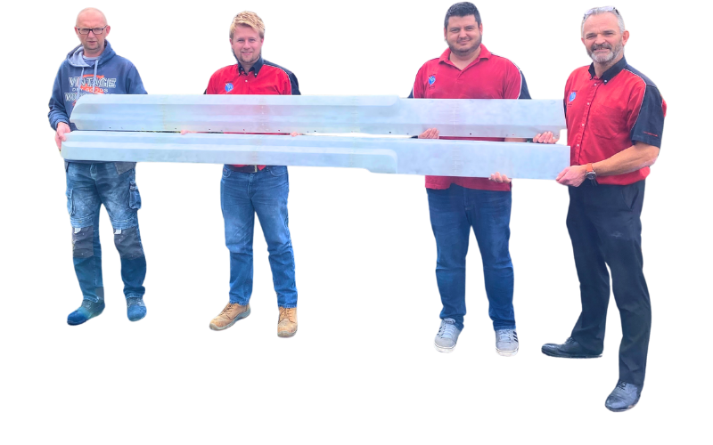 four employees at Malcolm Nicholls demonstrating how large we can print SLAs having two of the biggest 3D printers in the UK